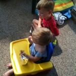 Boys eating at the cookout